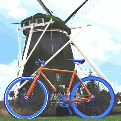 netherlands, bike in front of old mill