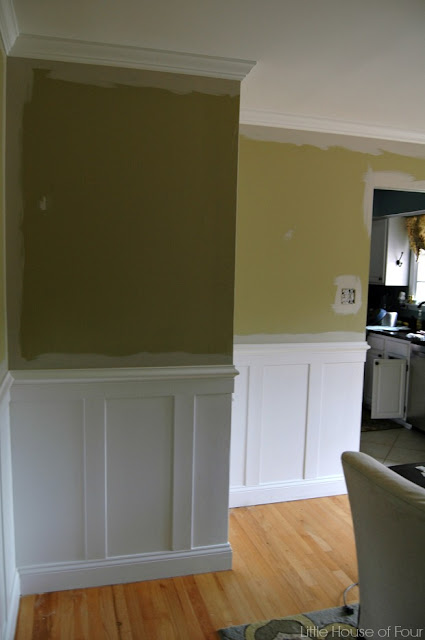 Updated dining room with Sherwin Williams Iron or and Accessible Beige.