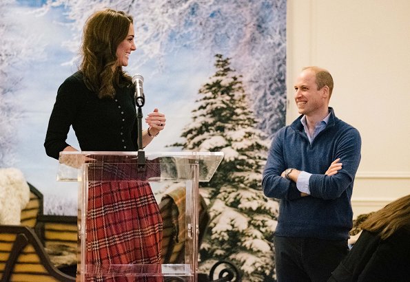 Kate Middleton wore Emilia Wickstead tartan pleated skirt. The Duchess wore a new cashmere cardigan by Brora
