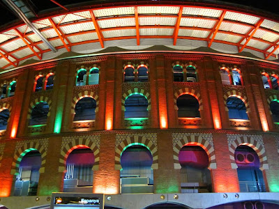 Las Arenas shopping mall lit at night