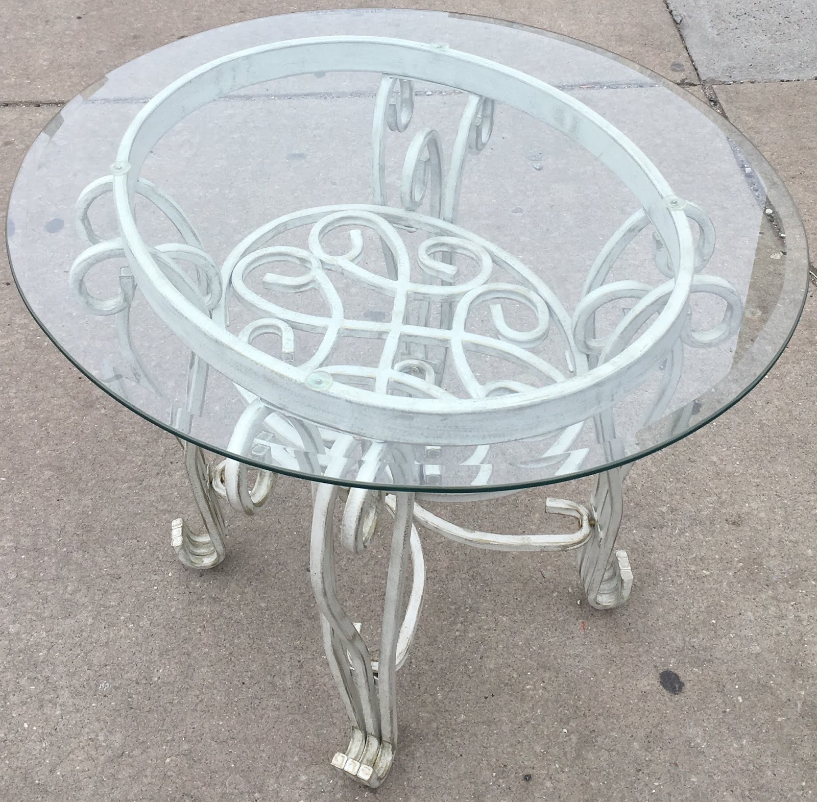 Uhuru Furniture & Collectibles Glass End Table with Cast Iron Base