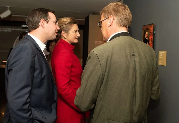 Duke Guillaume and Hereditary Grand Duchess Stéphanie at Night of Museums event. Stephanie wore red wool coat