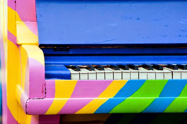 Close up of a multicoloured piano