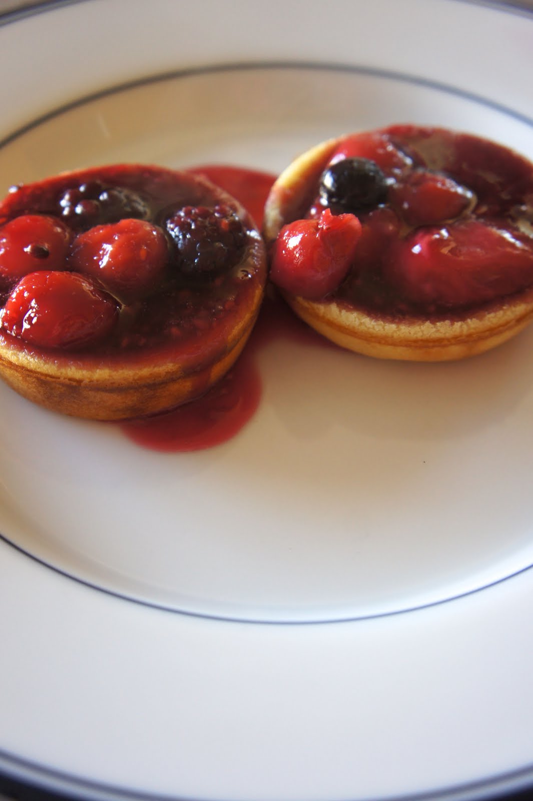 Savory Sweet and Satisfying Mini German Pancakes with Mixed Berry Sauce