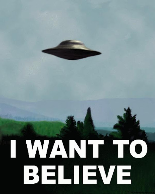 flying saucer picture says I want to believe