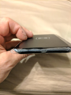 The MicroUSB port on the Charging Pad is Upside-Down A look at the upside-down microUSB port on the charging pad included in the S3 Qi wireless charging kit. The pad is shown with a plastic protective film on the underside that needs to be removed.