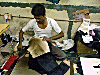 closeup of Indian tailor