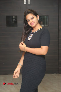 Actress Jyo Stills in Black Short Dress at Dwaraka Movie Audio Launch  0050