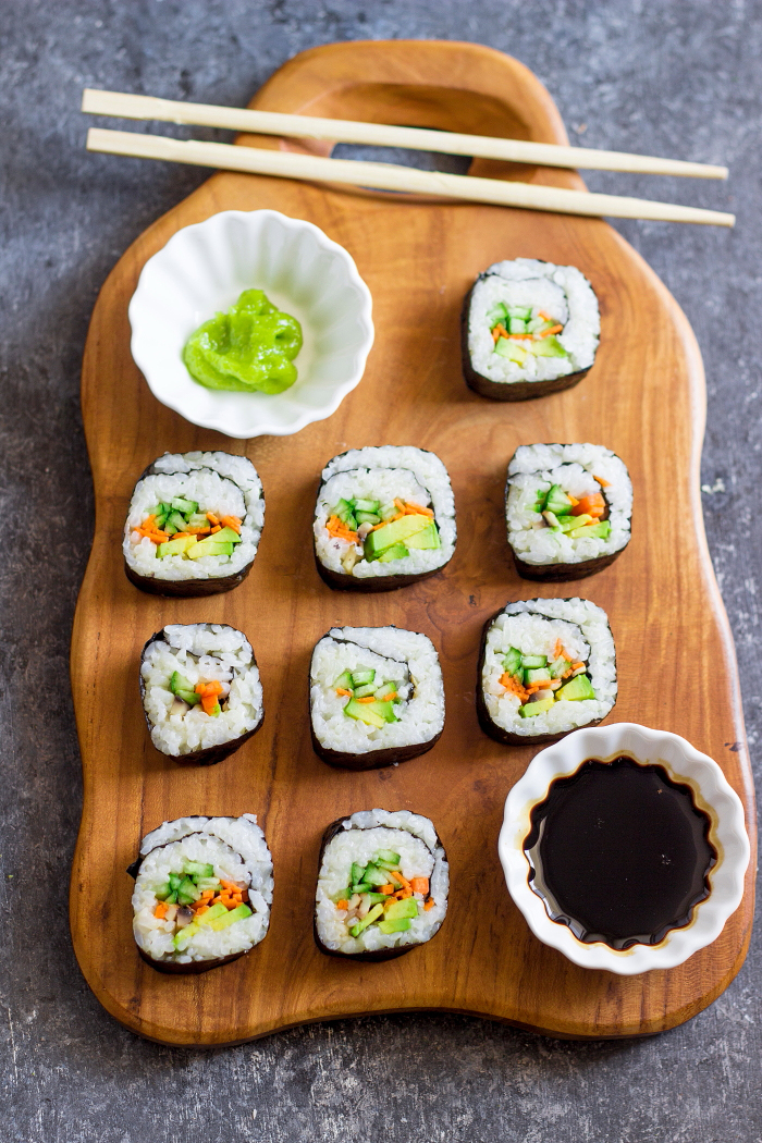 Avocado, cucumber, carrot vegan maki sushi roll