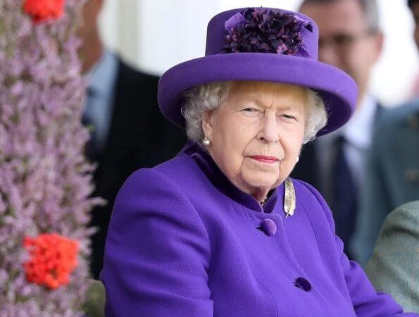 Queen Elizabeth, The Prince of Wales and Duchess of Cornwall, Autumn Phillips and Peter Phillips. Camilla wore a red wool coat by Burberry