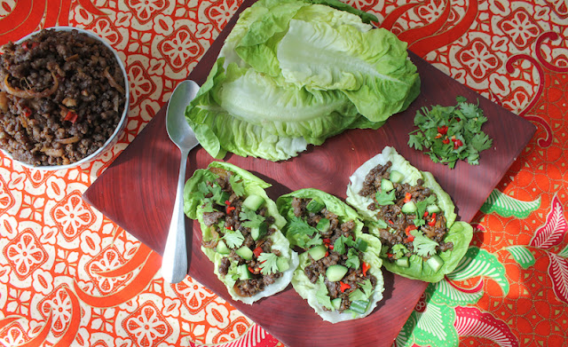 Food Lust People Love: Spicy beef lettuce cups make a great main course but they’d also be fun as appetizers. Put the lettuce leaves and spicy beef in the middle of the party table and let family and friends help themselves.