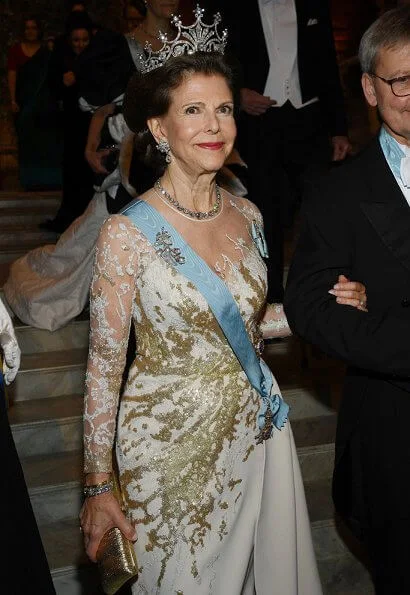 Queen Silvia in Elie Saab. Crown Princess Victoria in Camilla Thulin. wearing Angel Sanchez in pink. Princess Sofia diamond tiara