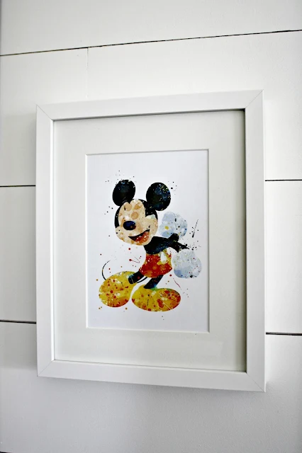 Our fun Disney art wall | Thrifty Decor Chick | Thrifty DIY, Decor and ...