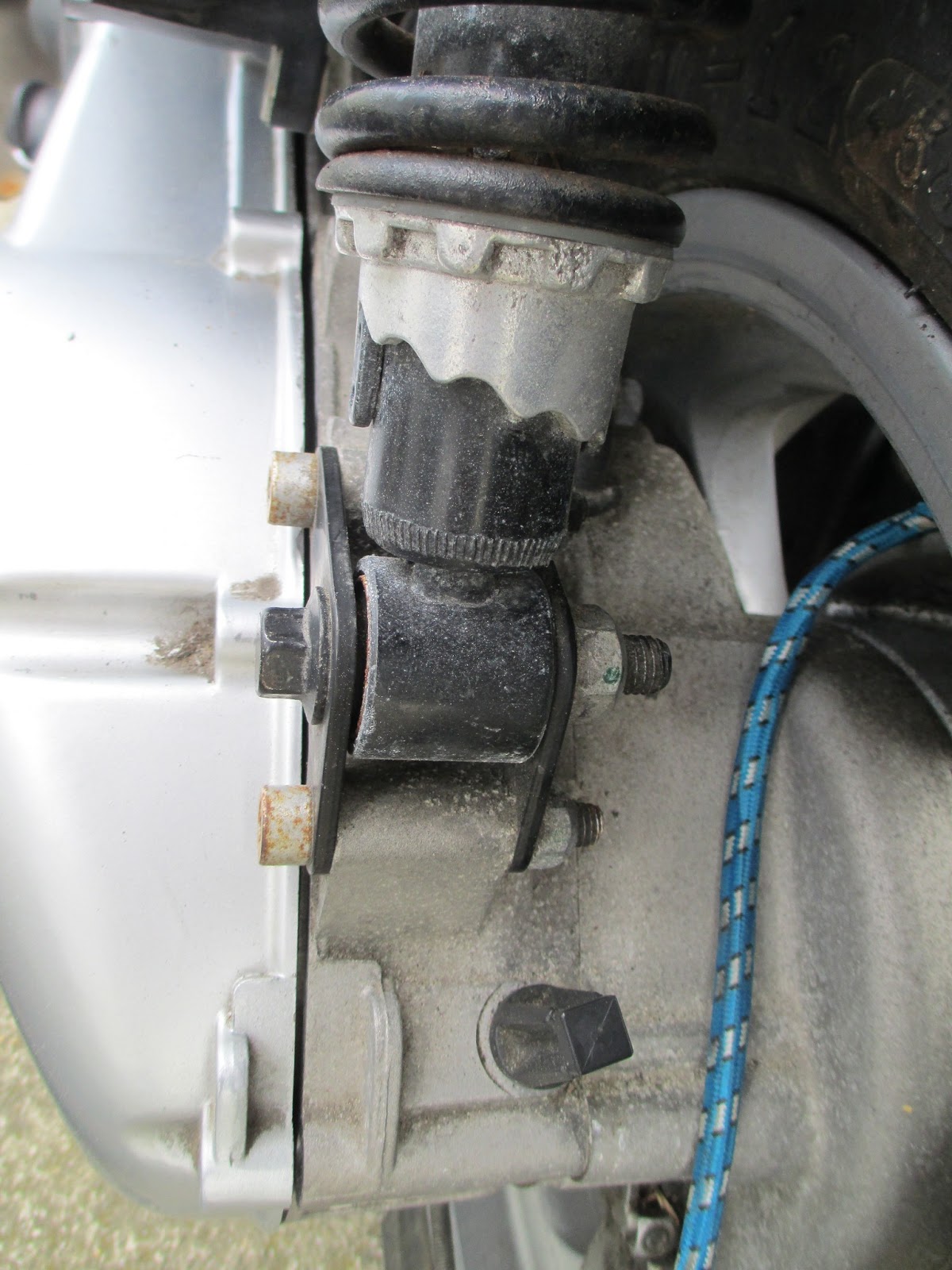 pix # 2 below rear shock bottom should swing out towards rear when  bolt/nuts are removed...or does engine just drop.