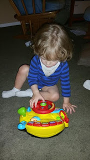 Baby grandson Tyler with the VTech Turn and Learn Driver Toy