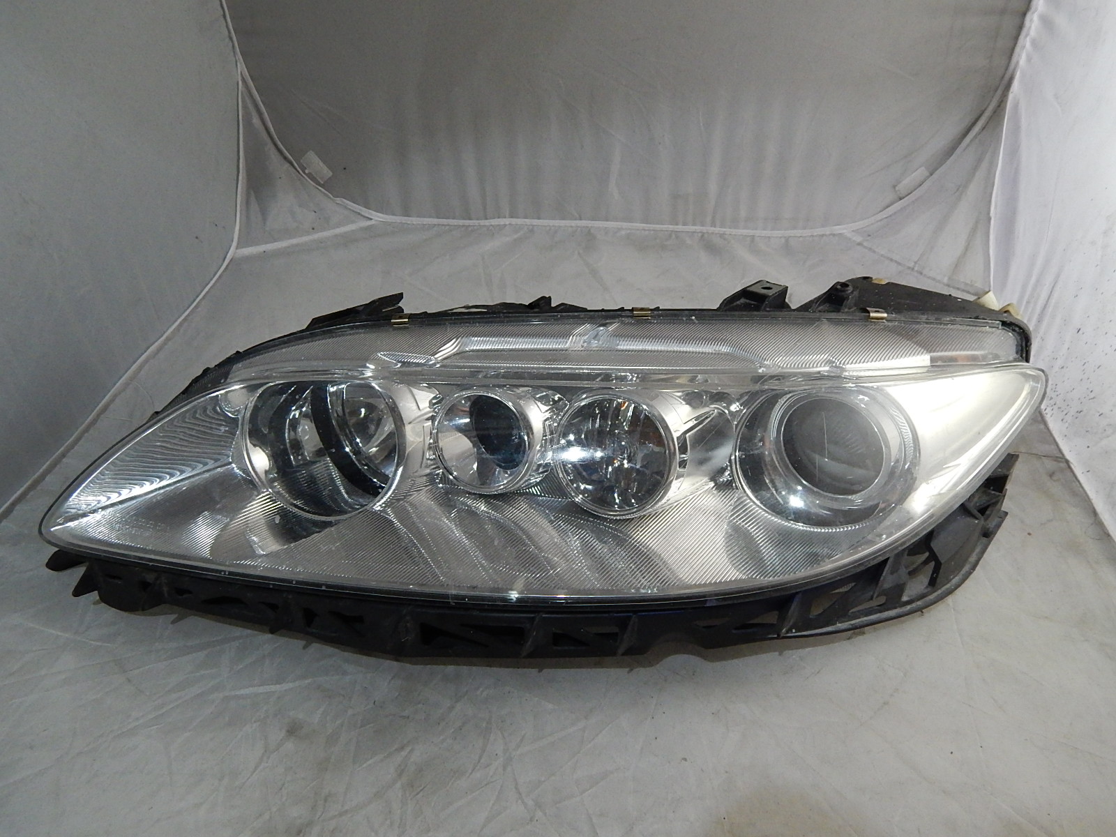 Naprawa świateł samochodowych Mazda6 lewa kompletna lampa