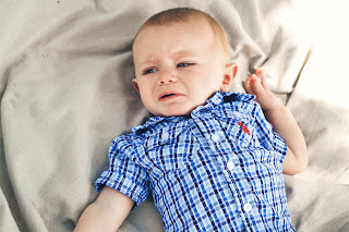 photo of baby wearing plaid