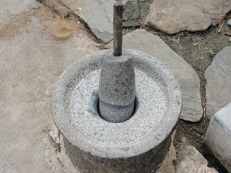 Grinding Stone and the wheel is Dharma