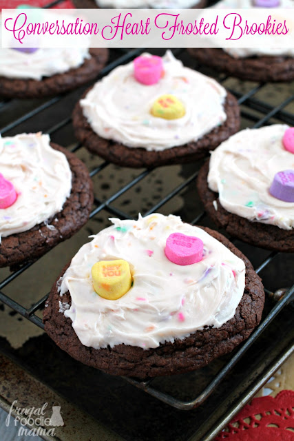 Fudgy & chewy brownie cookies are topped with an easy to make conversation heart frosting in these Conversation Heart Frosted Brookies.