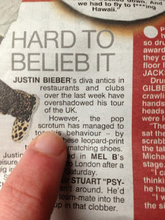 justin bieber newspaper headline fail funny