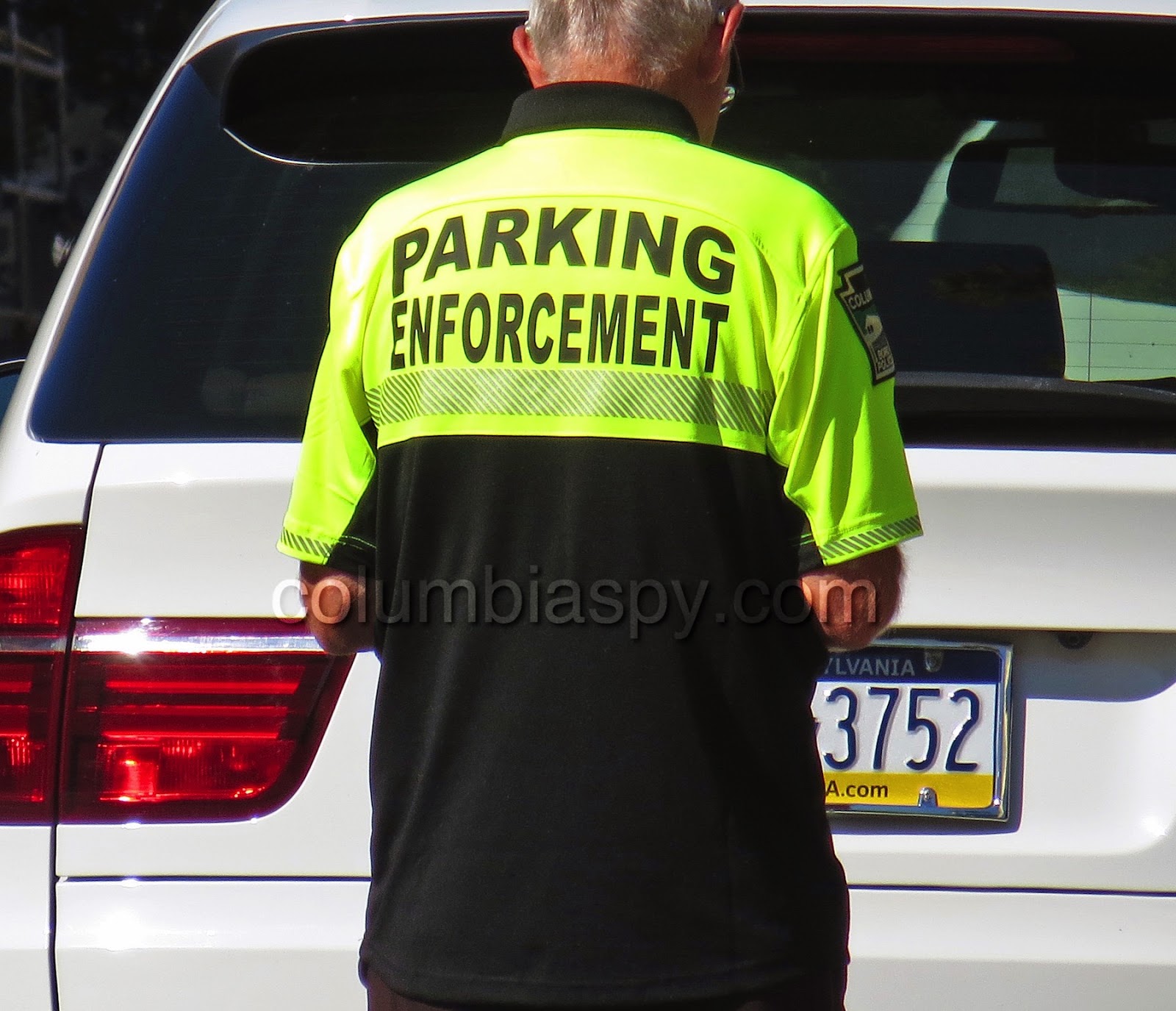 COLUMBIA SPY: New dayglo uniforms for parking enforcement officers