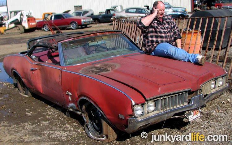 Keith Lively of Morris, Alabama discovered a rare 1969 Cutlass convertible on the chopping block at a local scrap yard and jumped into action. He bought what is normally unobtainable at scrap yards - an entire car.