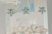 Sentiment was wet embossed with detailed silver embossing powder and there . (husband wife quilled blue flowers card zoomed)