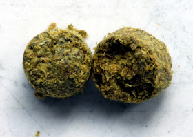 A traditional pellet on the left, a lupulin pellet on the right.