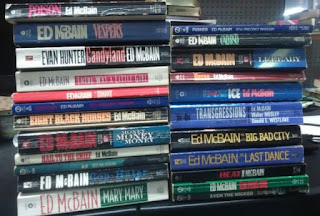 A stack of books by Ed McBain