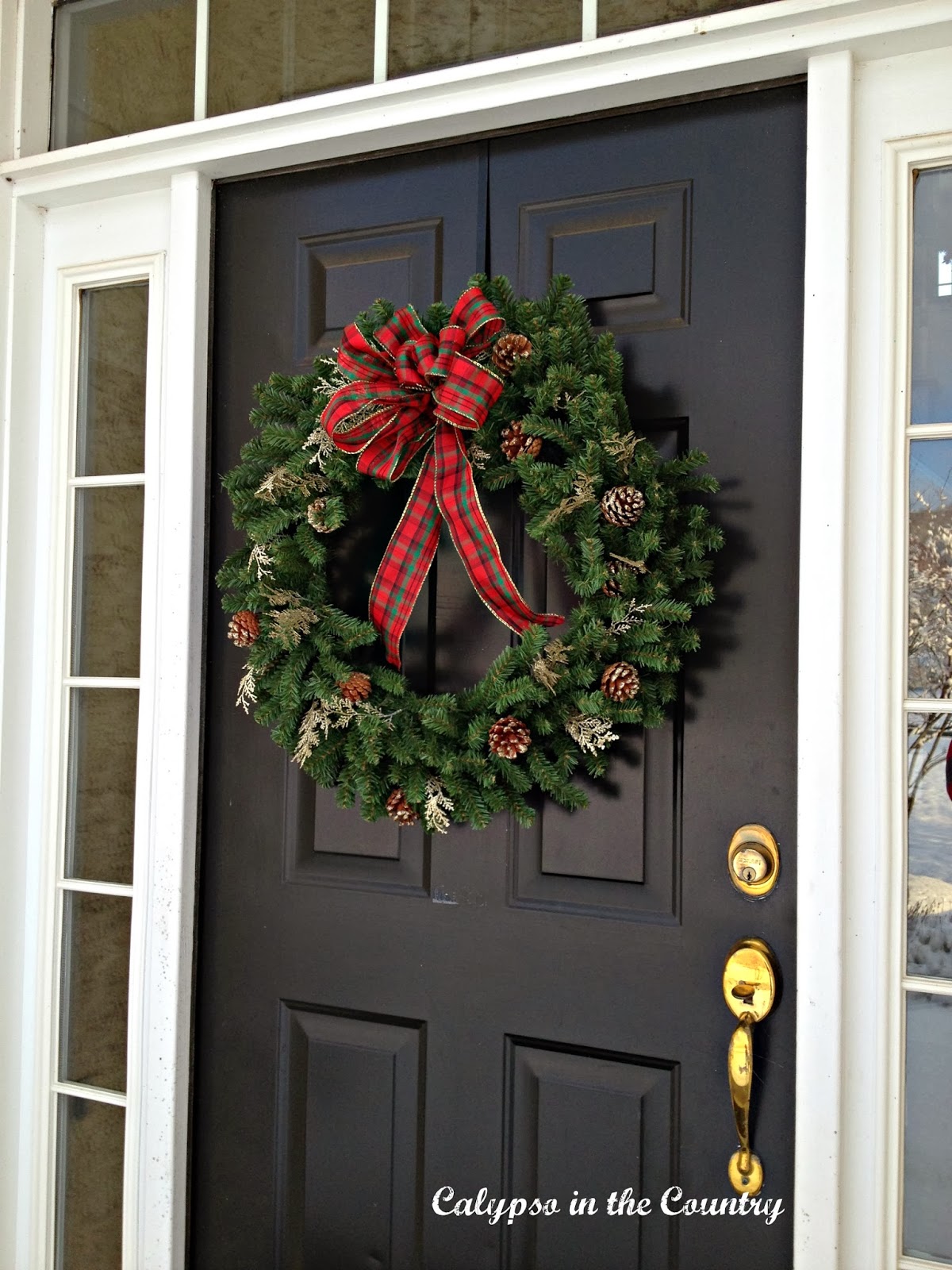 wreaths and bows for christmas calypso in the country snowing artificial christmas tree