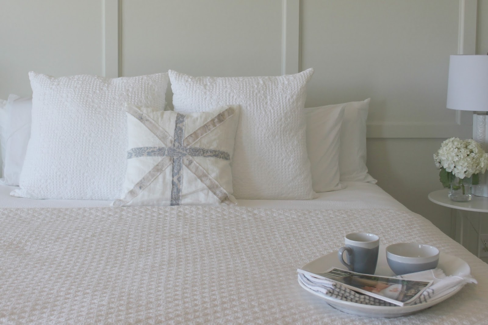 DIY bedroom decor makeover with serene, European inspired modern farmhouse style by Hello Lovely Studio