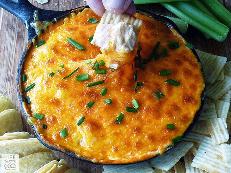 Buffalo Ranch Chicken Dip | by Life Tastes Good is a tangy, creamy dip that tastes like Buffalo Chicken Wings and ranch dressing all mixed into one delicious dip! This dip is super easy to make and a must for the Big Game! @Walmart #BigGameSnacks #ad