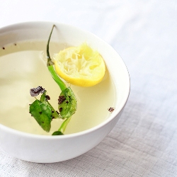 healthy spicy lime soup recipe with curry leaves, green chili, and black mustard seeds
