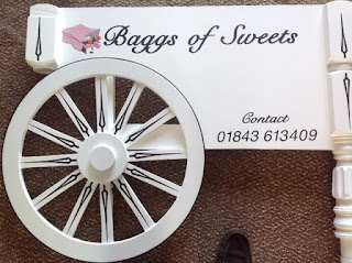 Bagg of Sweets with a contact number 01843613409 to order his services for events to have this lovely sweet cart.