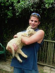 Drew and a 10-week-old lion cub