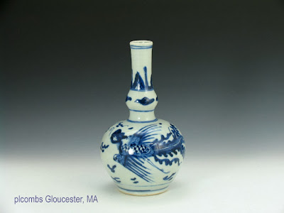 <img src="Chinese Transitional Double gourd vase .jpg" alt="blue and white porcelain jar with phoenix decorations">