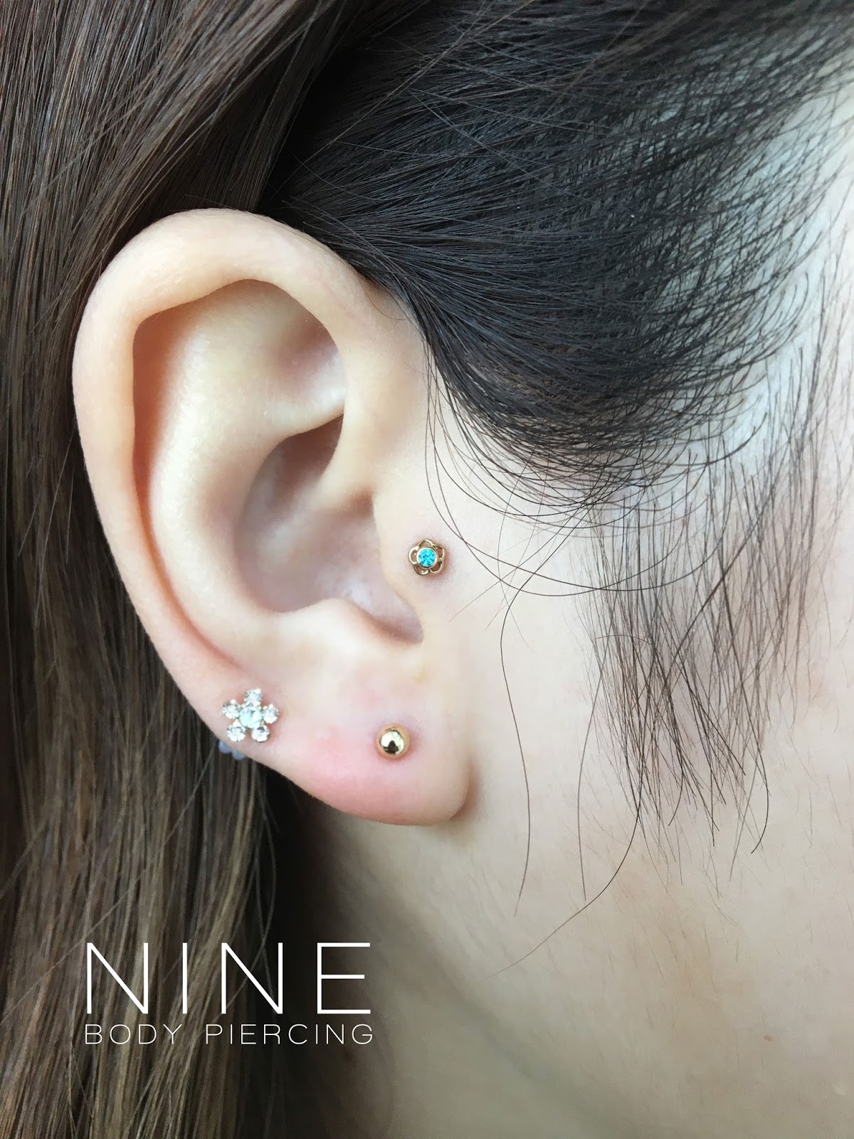 NINE BODY PIERCING BLOG: Healed Tragus with Anatometal Yellow Gold 