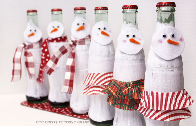 group of coca cola snowman bottles gifts, fun holiday craft idea