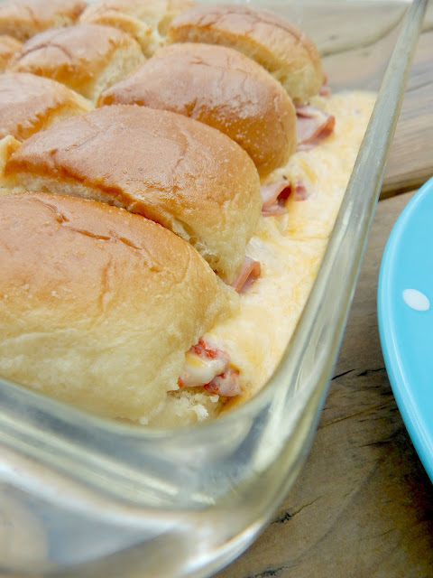 Ham and Pimento Cheese Sliders...a sandwich you will not be able to walk away from!  Salty ham, spicy pimento cheese all on a buttery bun.  Delicious! (sweetandsavoryfood.com)