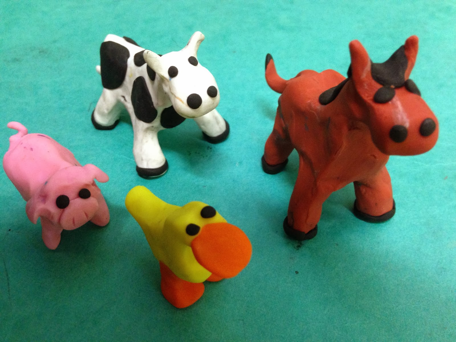 Farm animals with modelling clay.