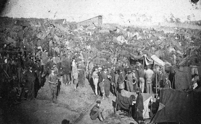 Union prisoners draw their rations in this view from main gate of Andersonville Prison, Georgia, on August 17, 1864.