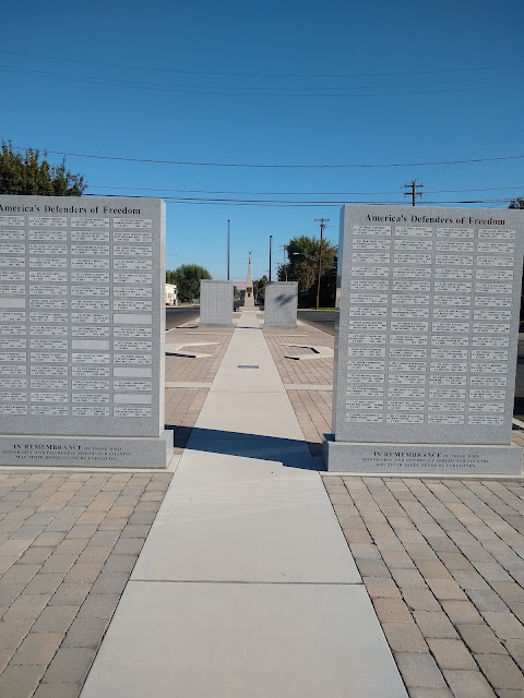 A view down the center of the Jerry Taylor Veterans Memorial Plaza in Sunnyside