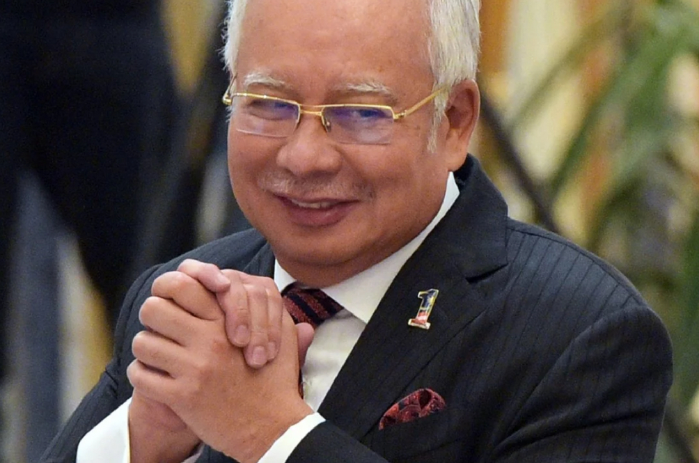 on a cobweb: Najib Razak's mess