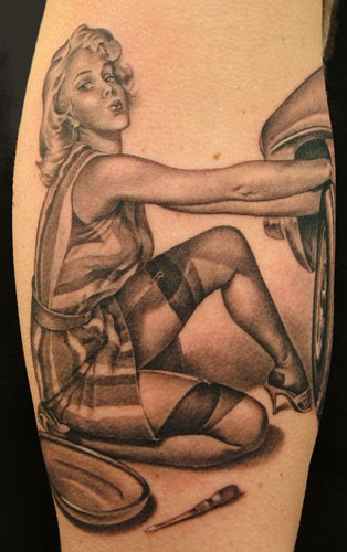 female tattoos on thigh