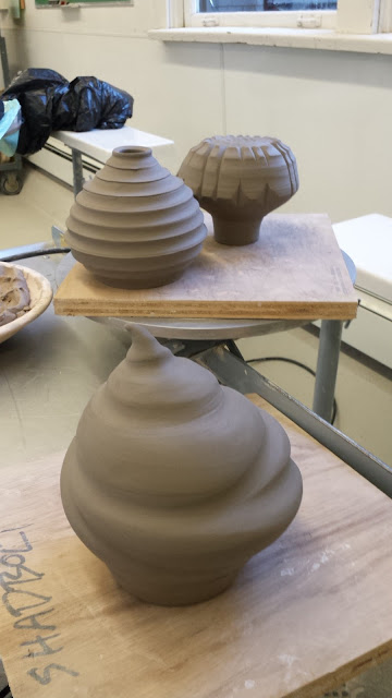 Pottery garden totem pieces by Lily L, in progress.