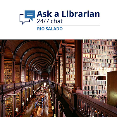 Image of a huge library, with Ask a Librarian banner above it.