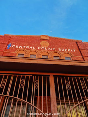 CENTRAL POLICE SUPPLY (Store front of red brick building on Houston Ave)  