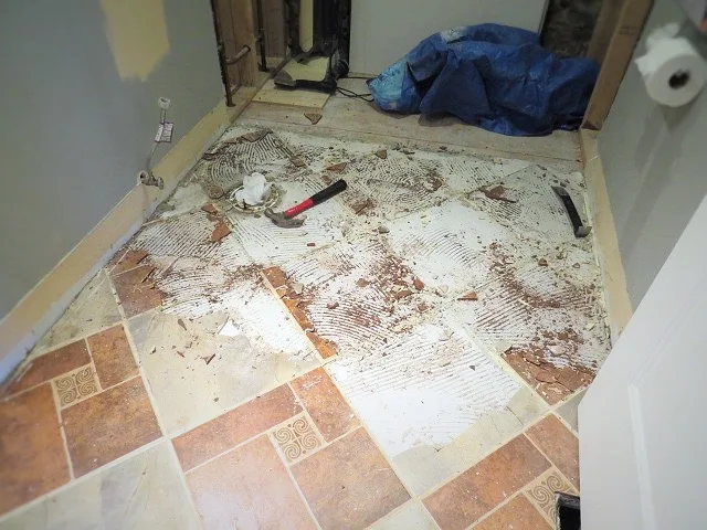 trying to remove floor tile