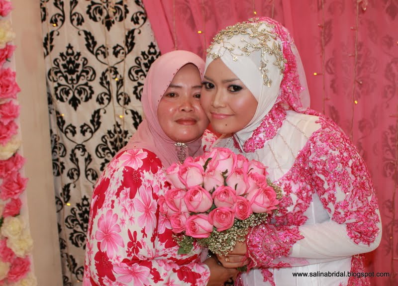 contoh baju pengantin muslimah sireh junjung