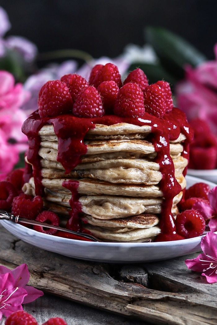 Vegan Oat Pancakes with Raspberry Coconut Sauce. Need more recipes? Find 21 Easy and Healthy Vegan Oat Recipes&nbsp;To Make Best Weight Loss Breakfast Ever! vegan breakfast oatmeal | raw oatmeal recipes | delicious oatmeal recipes |overnight oatmeal recipes | good oatmeal recipes #oats #oat #veganmeal #vegan 